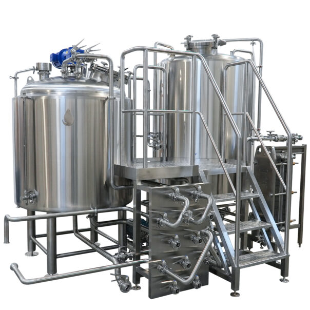 A jacketed stainless mixing vessel with a top-mounted agitator and sanitary clamp fittings.