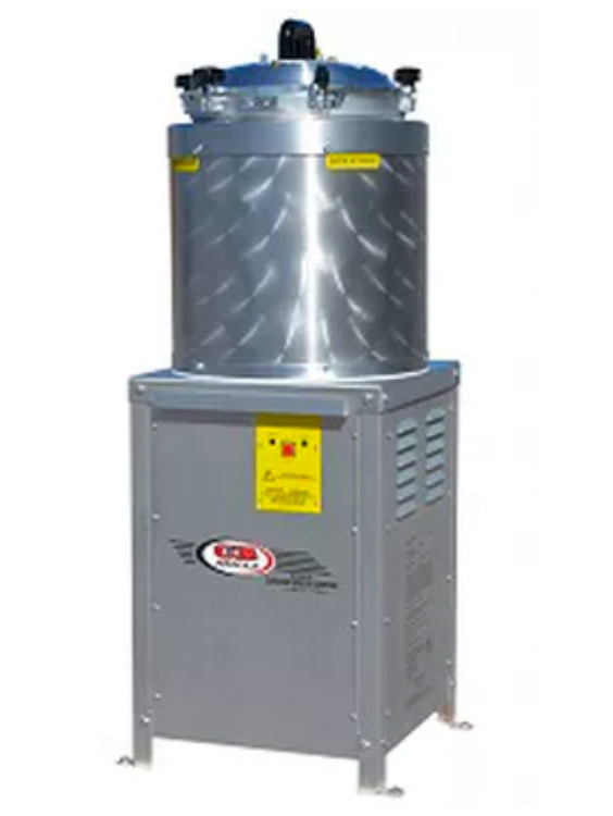A vertical fractionating column with reboiler and overhead condenser in continuous service.